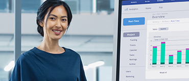 kl-icaew-power-bi-370x160 Woman making a presentation